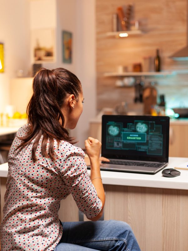happy-woman-hacker-after-cracking-firewall-government-getting-access-granted-programmer-writing-dangerous-malware-cyber-attacks-using-performance-laptop-during-midnight